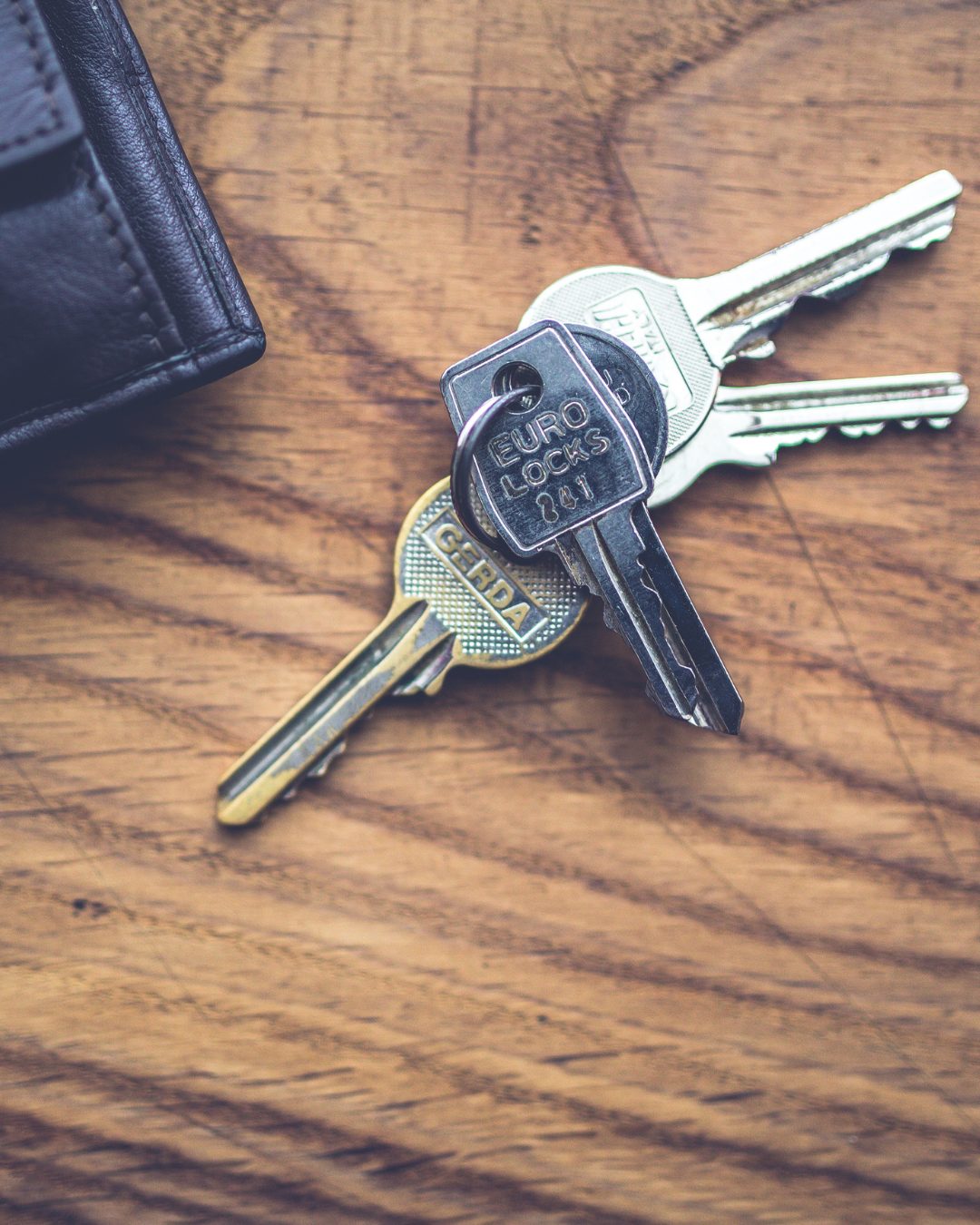 First time home buyer receiving house keys in West Tennessee real estate market