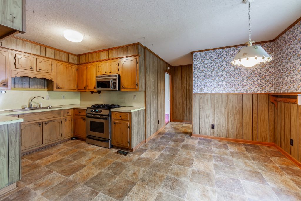 Older kitchen in a fixer upper home in West Tennessee showing renovation potential.