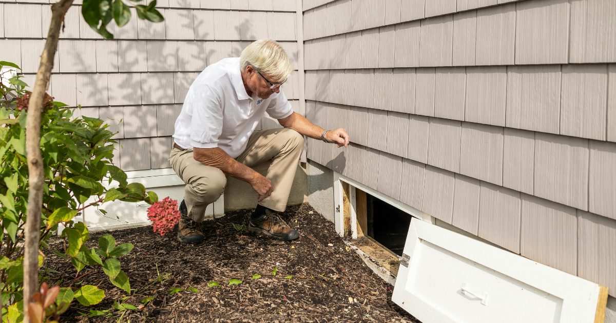 Professional home inspector evaluating a house during a home inspection in West Tennessee.