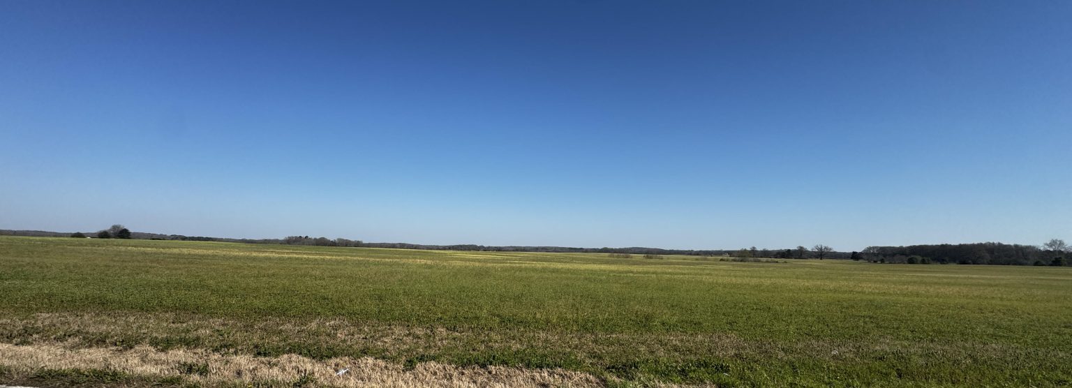 Wide open farmland and acreage in Pinson Tennessee showing rural space and privacy near Jackson TN.