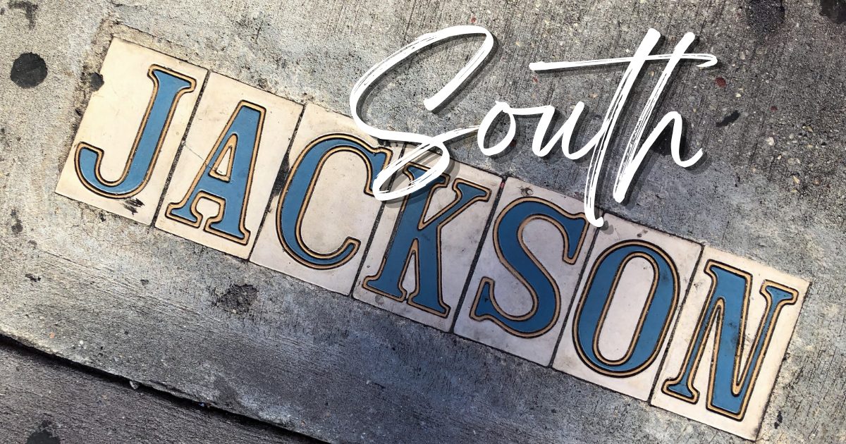 South Jackson Tennessee sidewalk mosaic sign in downtown Jackson TN Alt text should describe what the image actually shows, which this does while still including South Jackson Tennessee.