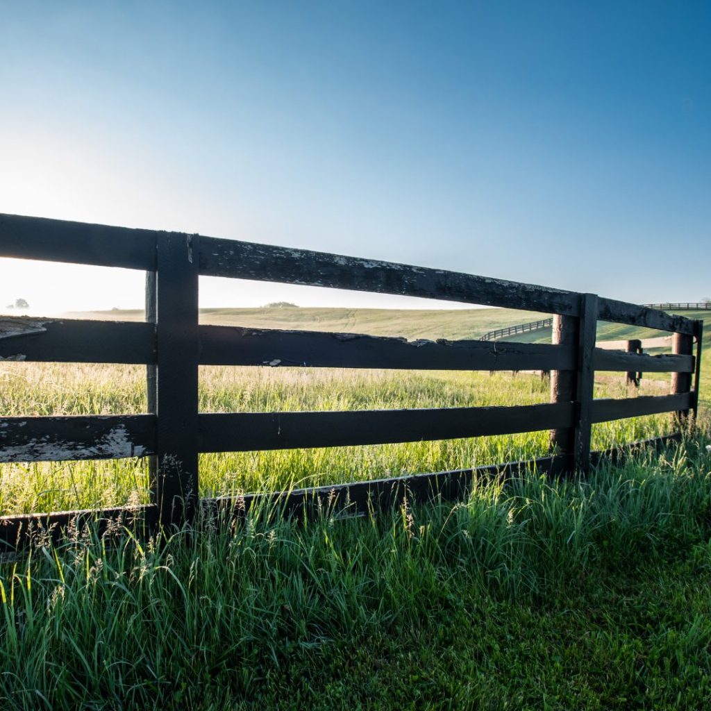 Wood farm fence and pasture land in rural West Tennessee near Beech Bluff and Jackson TN.