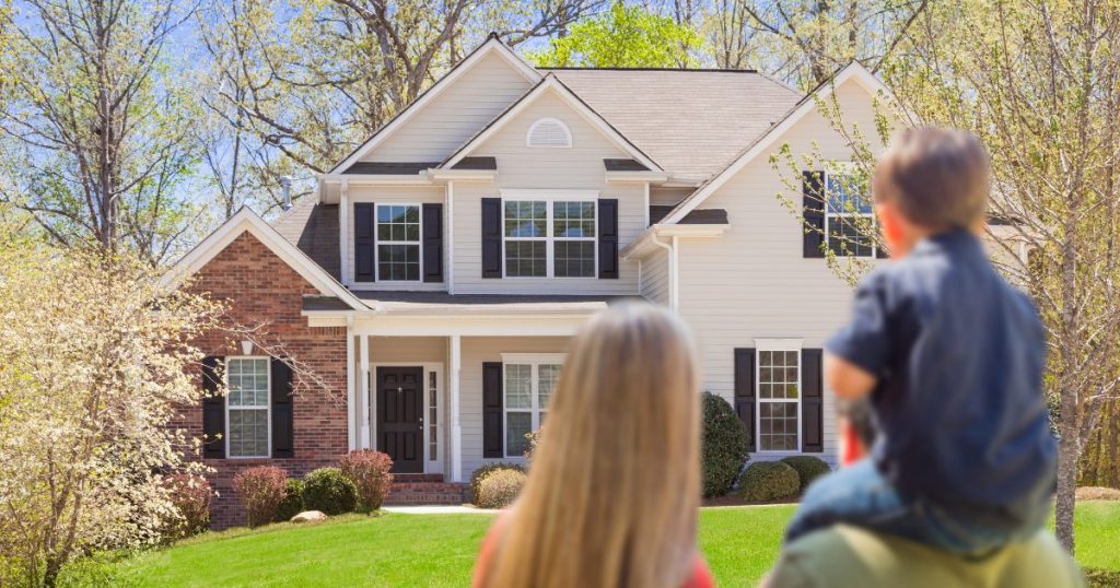 Buyers touring a home during spring real estate season in West Tennessee